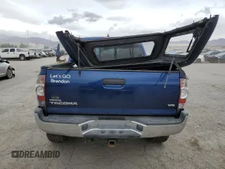 2014 Toyota Tacoma with VIN 5TFLU4EN7EX106909, listed as a Copart auction lot 46906235 with 102,681 mi miles and Salvage Title. Bid and sale history available at DreamBid. Image 6.