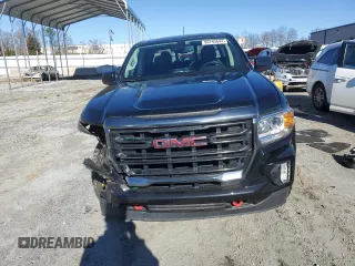 2021 GMC Canyon 4WD AT4 w/Leather with VIN 1GTG6FEN4M1155641, listed as a Copart auction lot 86793644 with 36,940 mi miles and Salvage Title. Bid and sale history available at carsss.com. Image 5.