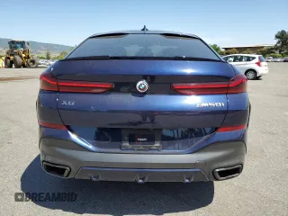 2023 BMW X6 M50i with VIN 5UXCY8C09P9P28422, listed as a Copart auction lot 52818133 with 4,131 mi miles and Salvage Title. Bid and sale history available at carsss.com. Image 6.