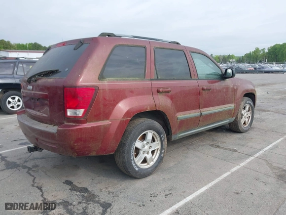 2007 Jeep Grand Cherokee Laredo with VIN 1J8GR48K27C535382, listed as a IAAI auction lot 42013097 with 180,554 mi miles. Bid and sale history available at carsss.com. Image 4.