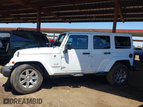 2016 Jeep Wrangler Unlimited Sahara with VIN 1C4BJWEG0GL126270, listed as a IAAI auction lot 42229364 with 50,847 mi miles and . Bid and sale history available at DreamBid. Image 14.