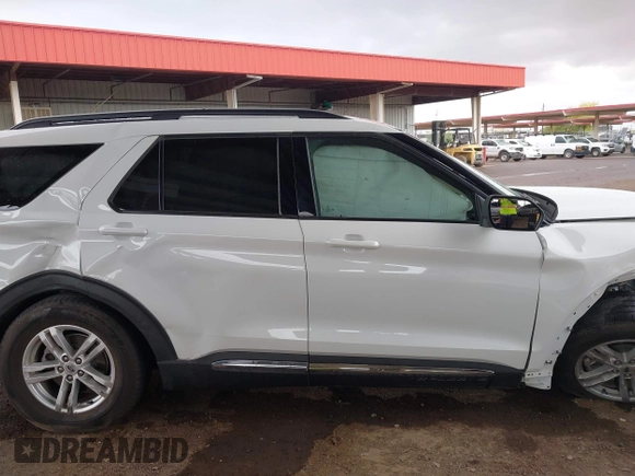 2022 Ford Explorer XLT z VIN 1FMSK7DH0NGB25926, wystawiony jako IAAI lot #42181595 z przebiegiem 15 063 mil mil oraz . Historia ofert i sprzedaży dostępna na DreamBid. Obrazek 13.
