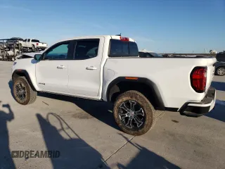 2023 GMC Canyon 4WD AT4 with VIN 1GTP6DEK6P1237045, listed as a Copart auction lot 74981784 with 18,036 mi miles and Salvage Title. Bid and sale history available at carsss.com. Image 2.