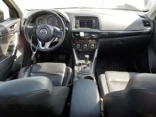2014 Mazda CX-5 Grand Touring with VIN JM3KE4DY1E0361849, listed as a Copart auction lot 52043465 with 349,688 mi miles and Clean Title. Bid and sale history available at carsss.com. Image 8.