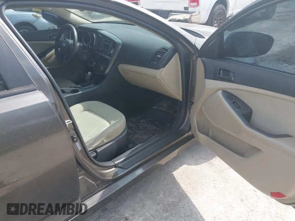 2011 Kia Optima LX with VIN KNAGM4A70B5162915, listed as a IAAI auction lot 42094325 with 156,169 mi miles and . Bid and sale history available at carsss.com. Image 5.