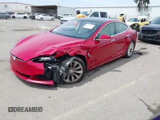 2018 Tesla Model S 75D with VIN 5YJSA1E29JF273494, listed as a IAAI auction lot 42246104 with 93,870 mi miles and . Bid and sale history available at DreamBid. Image 17.