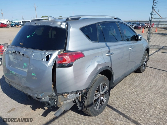 2016 Toyota RAV4 XLE with VIN 2T3WFREV1GW310309, listed as a IAAI auction lot 41993270 with 200,289 mi miles. Bid and sale history available at carsss.com. Image 4.