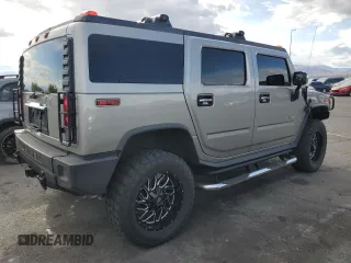 2005 Hummer H2 SUV z VIN 5GRGN23U65H106597, wystawiony jako Copart lot #54508345 z przebiegiem Nie podano mil oraz Szkoda całkowita • Salvage title. Historia ofert i sprzedaży dostępna na DreamBid. Obrazek 3.