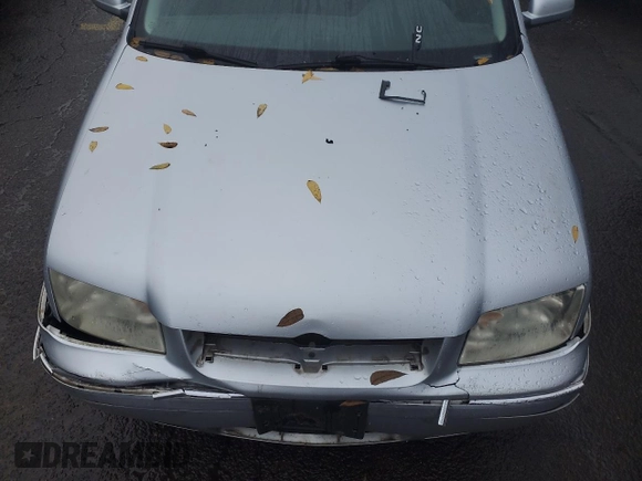 2004 Volkswagen Jetta GL z VIN 3VWRK69M54M030184, wystawiony jako Copart lot #77764124 z przebiegiem 97 634 mil mil oraz Szkoda całkowita • Salvage title. Historia ofert i sprzedaży dostępna na DreamBid. Obrazek 11.