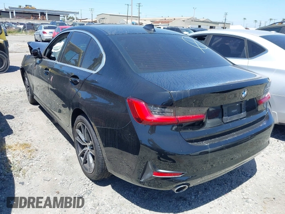 2021 BMW 3 Series 330i with VIN 3MW5R1J09M8C21377, listed as a IAAI auction lot 41892259 with Not Provided miles and . Bid and sale history available at carsss.com. Image 3.