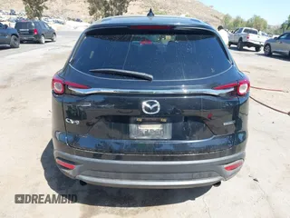 2020 Mazda CX-9 Sport with VIN JM3TCABY8L0407430, listed as a IAAI auction lot 42288490 with 50,317 mi miles and . Bid and sale history available at DreamBid. Image 16.