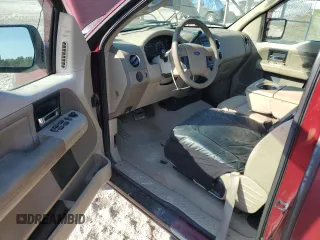 2005 Ford F-150 XLT with VIN 1FTPX02595KF03248, listed as a Copart auction lot 77145414 with 161,783 mi miles and Salvage Title. Bid and sale history available at carsss.com. Image 8.