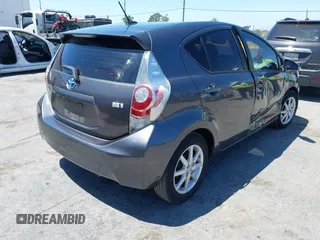 2012 Toyota Prius One z VIN JTDKDTB34C1015136, wystawiony jako IAAI lot #42332607 z przebiegiem 134 905 mil mil oraz . Historia ofert i sprzedaży dostępna na DreamBid. Obrazek 4.