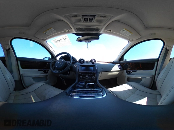 2014 Jaguar XJ Portfolio with VIN SAJWA2GZ4E8V60251, listed as a IAAI auction lot 41778702 with 45,180 mi miles and . Bid and sale history available at DreamBid. Image 18.