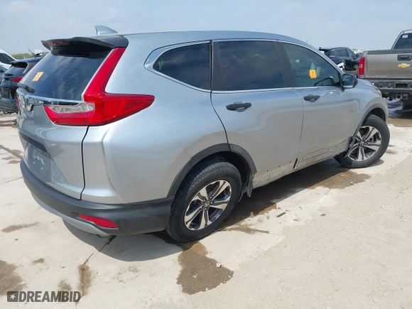2017 Honda CR-V LX with VIN 7FARW5H38HE014201, listed as a IAAI auction lot 42044460 with 82,174 mi miles. Bid and sale history available at carsss.com. Image 4.