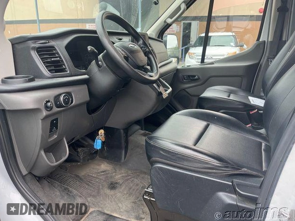 2021 Ford Transit Cargo with VIN 1FTYE1C89MKA78153, listed as a IAAI auction lot 42835600 with 88,619 mi miles and . Bid and sale history available at DreamBid. Image 2.
