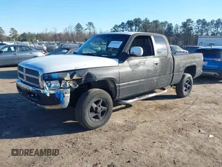 1998 Dodge 1500 z VIN 3B7HF13YXWG142885, wystawiony jako IAAI lot #41404805 z przebiegiem 252 588 mil mil oraz . Historia ofert i sprzedaży dostępna na DreamBid. Obrazek 2.