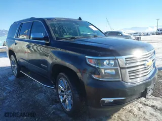 2016 Chevrolet Tahoe LTZ with VIN 1GNSKCKC7GR420945, listed as a IAAI auction lot 41414565 with 134,465 mi miles. Bid and sale history available at carsss.com. Image 1.