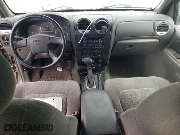 2003 GMC Envoy SLE z VIN 1GKDT13S332365071, wystawiony jako Copart lot #52811295 z przebiegiem Nie podano mil oraz Szkoda całkowita • Salvage title. Historia ofert i sprzedaży dostępna na DreamBid. Obrazek 8.