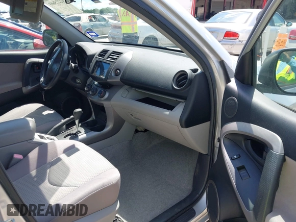 2006 Toyota RAV4 with VIN JTMZD33V866020359, listed as a IAAI auction lot 42225669 with 176,458 mi miles and . Bid and sale history available at DreamBid. Image 5.