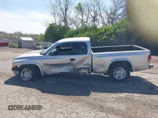 2001 Dodge Dakota SLT with VIN 1B7GG22XX1S348751, listed as a IAAI auction lot 42077395 with 148,034 mi miles and . Bid and sale history available at carsss.com. Image 15.