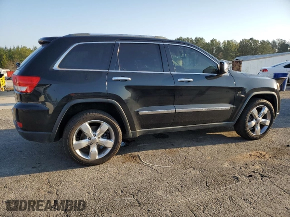2011 Jeep Grand Cherokee Overland with VIN 1J4RS6GT5BC648076, listed as a Copart auction lot 48878135 with 223,263 mi miles and Salvage Title. Bid and sale history available at DreamBid. Image 3.