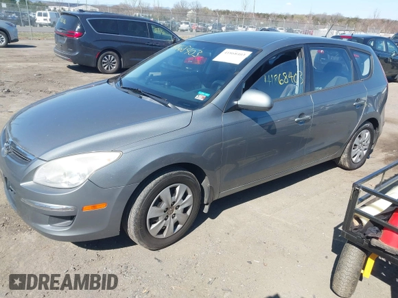 2011 Hyundai Elantra Touring GLS with VIN KMHDB8AE5BU089687, listed as a IAAI auction lot 41868403 with 231,671 mi miles. Bid and sale history available at carsss.com. Image 2.