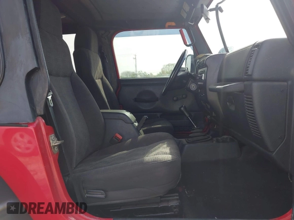 2004 Jeep Wrangler Sport with VIN 1J4FA49S54P744171, listed as a IAAI auction lot 41974657 with 173,230 mi miles. Bid and sale history available at carsss.com. Image 5.