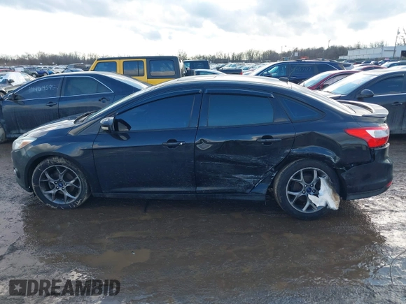 2013 Ford Focus SE z VIN 1FADP3F27DL342384, wystawiony jako IAAI lot #41474290 z przebiegiem 125 664 mil mil oraz . Historia ofert i sprzedaży dostępna na DreamBid. Obrazek 15.