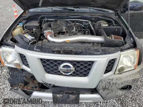 2010 Nissan Xterra S with VIN 5N1AN0NW8AC506660, listed as a Copart auction lot 55810805 with 203,227 mi miles and Salvage title. Bid and sale history available at DreamBid. Image 12.