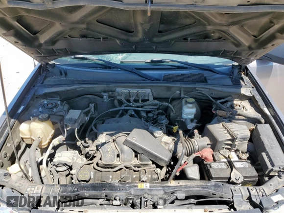 2008 Ford Escape XLT with VIN 1FMCU03198KD65116, listed as a Copart auction lot 52130965 with 214,295 mi miles and Salvage title. Bid and sale history available at DreamBid. Image 12.