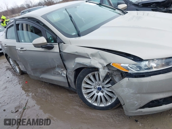 2015 Ford Fusion S Hybrid with VIN 3FA6P0UU4FR111409, listed as a IAAI auction lot 41447316 with 150,068 mi miles. Bid and sale history available at carsss.com. Image 6.