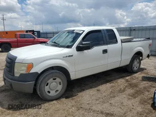 2009 Ford F-150 STX with VIN 1FTRX12W39KA70541, listed as a Copart auction lot 58825805 with 167,850 mi miles and Salvage title. Bid and sale history available at DreamBid. Image 1.