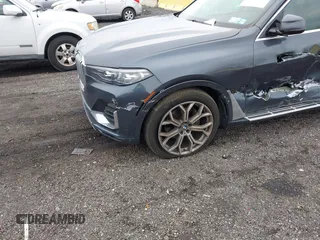 2020 BMW X7 xDrive40i z VIN 5UXCW2C03L9B38605, wystawiony jako IAAI lot #42026801 z przebiegiem 82 394 mil mil oraz . Historia ofert i sprzedaży dostępna na DreamBid. Obrazek 17.