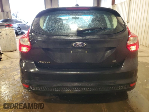 2012 Ford Focus SE z VIN 1FAHP3K24CL407570, wystawiony jako Copart lot #56002135 z przebiegiem 122 730 mil mil oraz Szkoda całkowita • Salvage title. Historia ofert i sprzedaży dostępna na DreamBid. Obrazek 6.