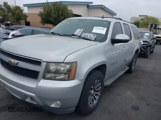 2010 Chevrolet Suburban LT with VIN 1GNUCJE03AR238548, listed as a IAAI auction lot 42104596 with 153,959 mi miles and . Bid and sale history available at DreamBid. Image 17.
