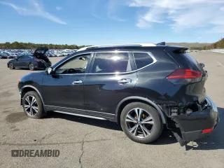 2019 Nissan Rogue SV with VIN JN8AT2MV1KW381701, listed as a Copart auction lot 49676375 with 104,157 mi miles and Salvage Title. Bid and sale history available at carsss.com. Image 2.