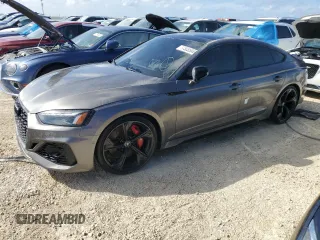2022 Audi RS 5 Sportback z VIN WUAAWCF57NA901250, wystawiony jako Copart lot #77305584 z przebiegiem Nie podano mil oraz Nie do naprawy. Historia ofert i sprzedaży dostępna na DreamBid. Obrazek 1.