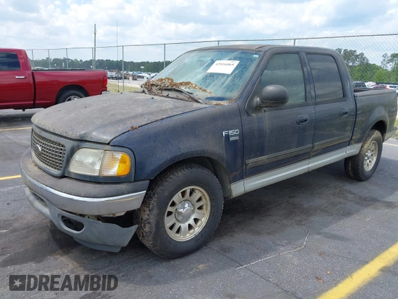 2003 Ford F-150 XLT with VIN 1FTRW076X3KC61967, listed as a IAAI auction lot 42016065 with 206,256 mi miles. Bid and sale history available at carsss.com. Image 2.