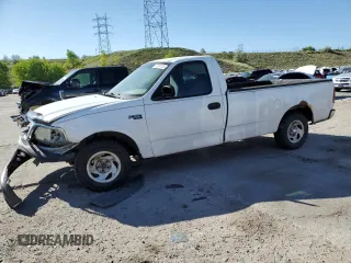2001 Ford F-150 XL with VIN 3FTZF17211MA71306, listed as a Copart auction lot 57824475 with 186,866 mi miles and Salvage title. Bid and sale history available at DreamBid. Image 1.