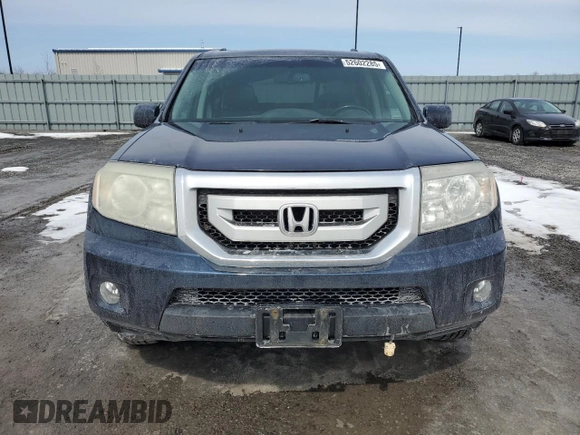 2010 Honda Pilot Touring with VIN 5FNYF4H99AB501127, listed as a Copart auction lot 52602285 with 271,602 mi miles and Salvage Title. Bid and sale history available at carsss.com. Image 5.