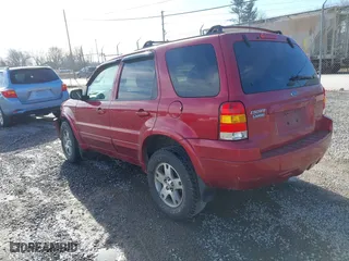 2005 Ford Escape Limited with VIN 1FMYU04185KA45589, listed as a IAAI auction lot 41575051 with 103,284 mi miles. Bid and sale history available at carsss.com. Image 3.