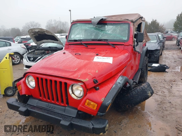 2000 Jeep Wrangler SE with VIN 1J4FA29P7YP793068, listed as a IAAI auction lot 41576287 with 113,298 mi miles. Bid and sale history available at carsss.com. Image 6.