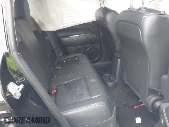 2015 Jeep Compass Latitude with VIN 1C4NJDEB3FD105704, listed as a IAAI auction lot 41719603 with 106,904 mi miles. Bid and sale history available at carsss.com. Image 8.