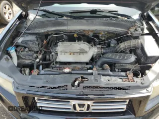 2008 Honda Ridgeline RT z VIN 2HJYK16278H514703, wystawiony jako Copart lot #56307545 z przebiegiem 218 338 mil mil oraz Czysty tytuł • Clean title. Historia ofert i sprzedaży dostępna na DreamBid. Obrazek 11.