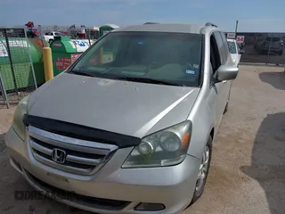 2005 Honda Odyssey EX with VIN 5FNRL38415B039809, listed as a IAAI auction lot 41884459 with 231,258 mi miles. Bid and sale history available at carsss.com. Image 6.