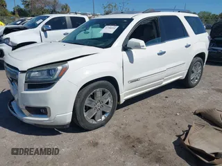2013 GMC Acadia Denali with VIN 1GKKVTKD5DJ205295, listed as a IAAI auction lot 41708410 with 192,493 mi miles. Bid and sale history available at carsss.com. Image 2.