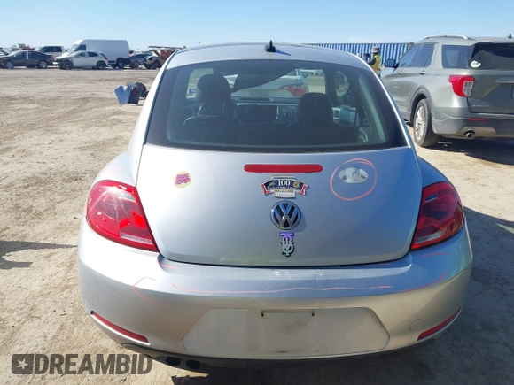 2013 Volkswagen Beetle 2.5L w/Sun/Sound/Nav with VIN 3VWJX7AT3DM663774, listed as a IAAI auction lot 41738146 with 98,064 mi miles and . Bid and sale history available at DreamBid. Image 16.