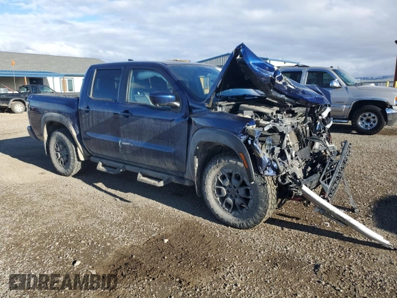 2023 Nissan Frontier Pro-4X z VIN 1N6ED1EK0PN610517, wystawiony jako Copart lot #87213324 z przebiegiem 51 648 mil mil oraz Szkoda całkowita • Salvage title. Historia ofert i sprzedaży dostępna na DreamBid. Obrazek 4.
