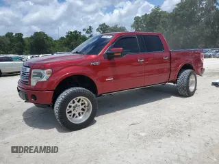 2013 Ford F-150 XL with VIN 1FTFW1ETXDFA11737, listed as a Copart auction lot 63188015 with 130,878 mi miles and Salvage title. Bid and sale history available at DreamBid. Image 1.